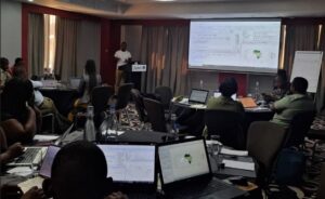 One Health Trust Facilitator, Gilbert Osena, taking participants through GIS for R software in Lusaka, Zambia