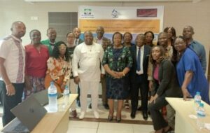 Participants, including (L to R) Prof Joël Fleury Djoba Siawaya, Director of LNSP (centre, in white), Dr Elise Eyang Obame, Permanent Secretary of the Ministry of Health and Social Affairs, and Mr Bernard Nzondo Kombe, General Director of Laboratories and Medical Imaging