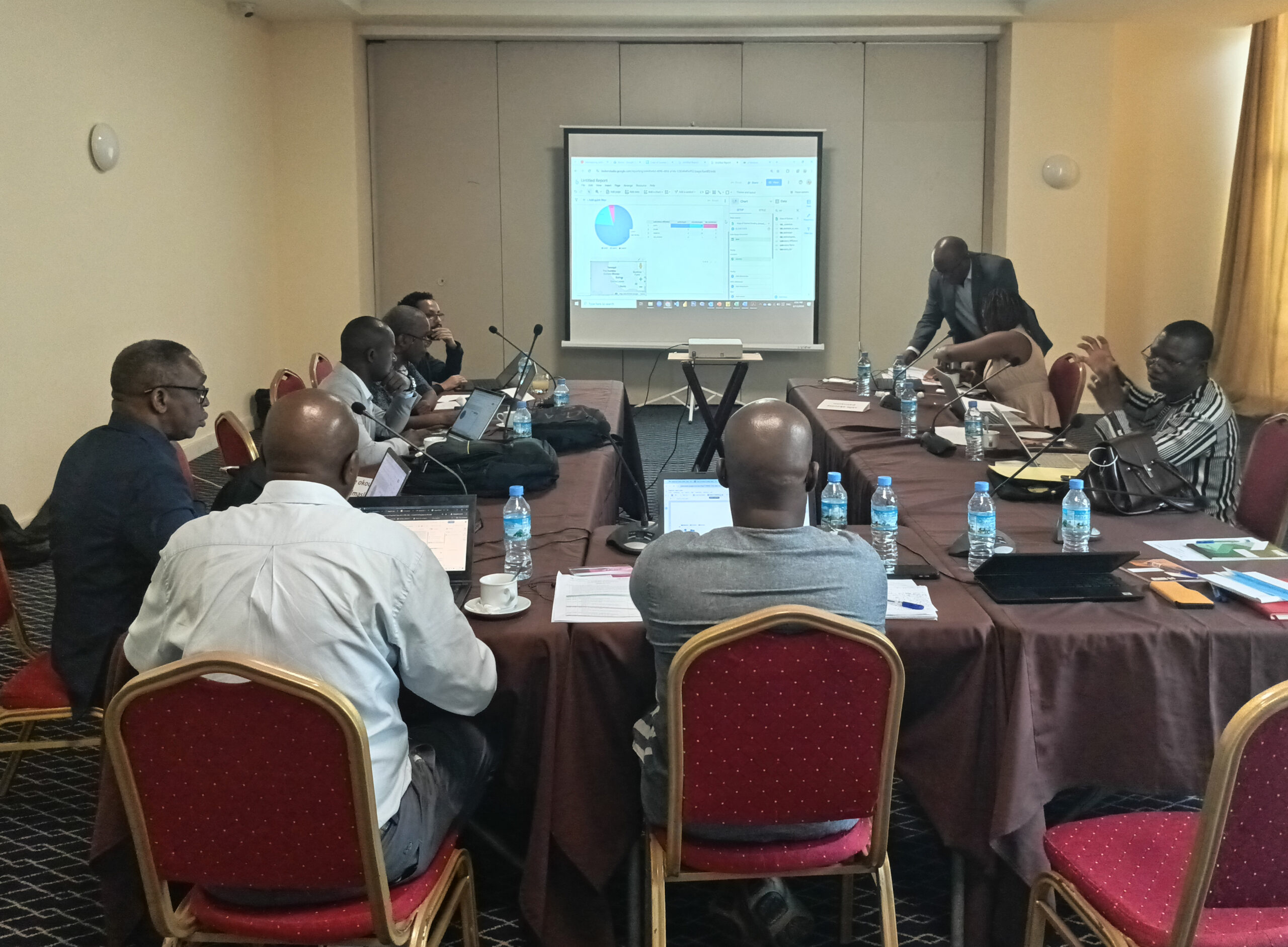 Participants review data from the LabMaP exercise in Guinea.